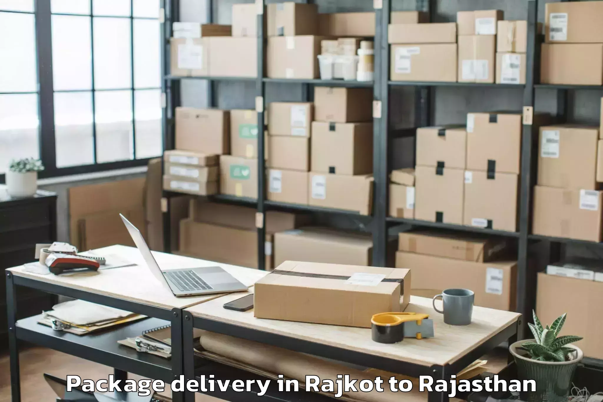 Trusted Rajkot to Amet Package Delivery